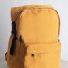 KIIRO is a bright yellow backpack designed for everyday use, short getaways, or heading back to school. Its compact size makes it perfect for carrying just the essentials, while the bold color and unique design help you stand out in any crowd.