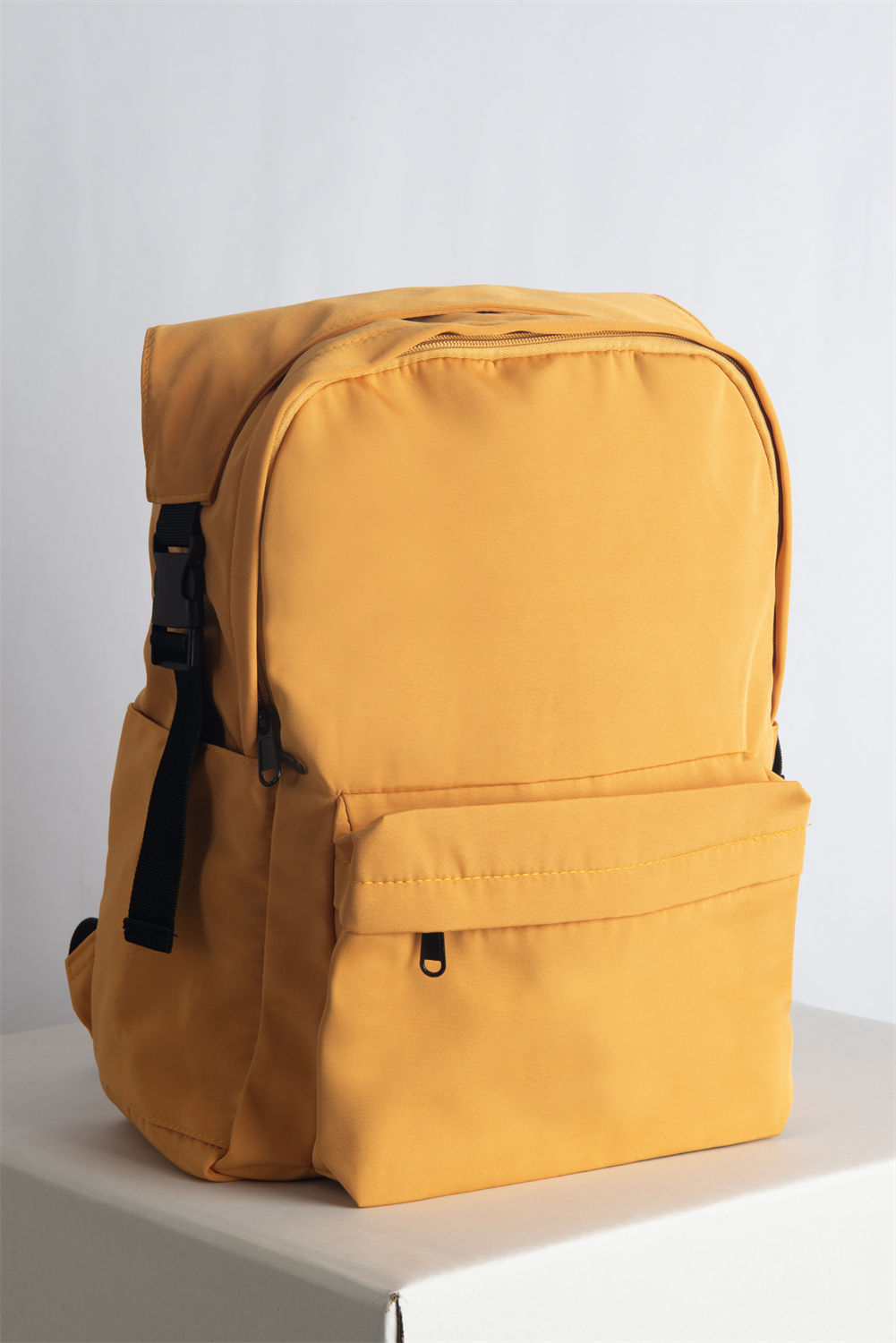 KIIRO is a bright yellow backpack designed for everyday use, short getaways, or heading back to school. Its compact size makes it perfect for carrying just the essentials, while the bold color and unique design help you stand out in any crowd.