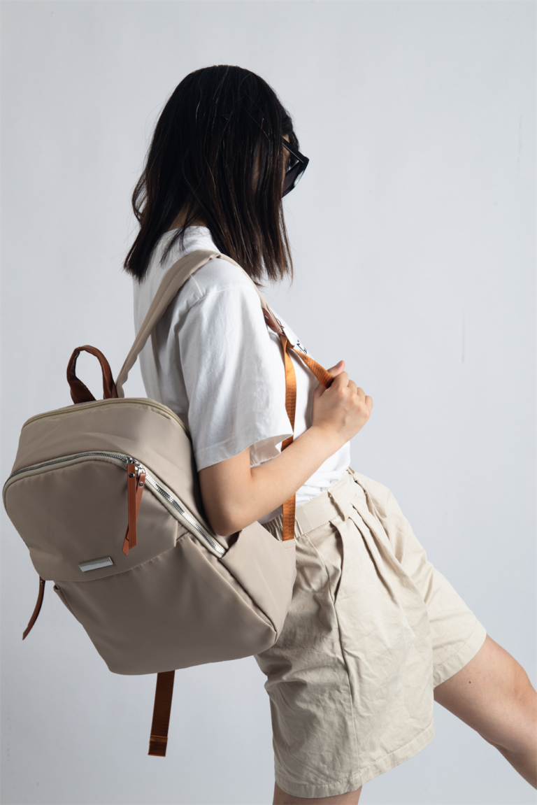 REDI is the perfect blend of classic elegance and urban practicality. This soft, waterproof backpack is designed for professionals on the move, featuring multiple compartments and a spacious fit for laptops up to 15 inches. Equipped with a trolley sleeve for easy travel and a secure anti-theft pocket, REDI ensures your belongings stay safe during business trips and daily commutes.