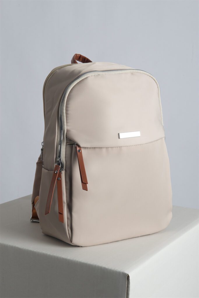 Soft waterproof professional backpack with trolley sleeve and anti-theft pocket, fits 15-inch laptop.