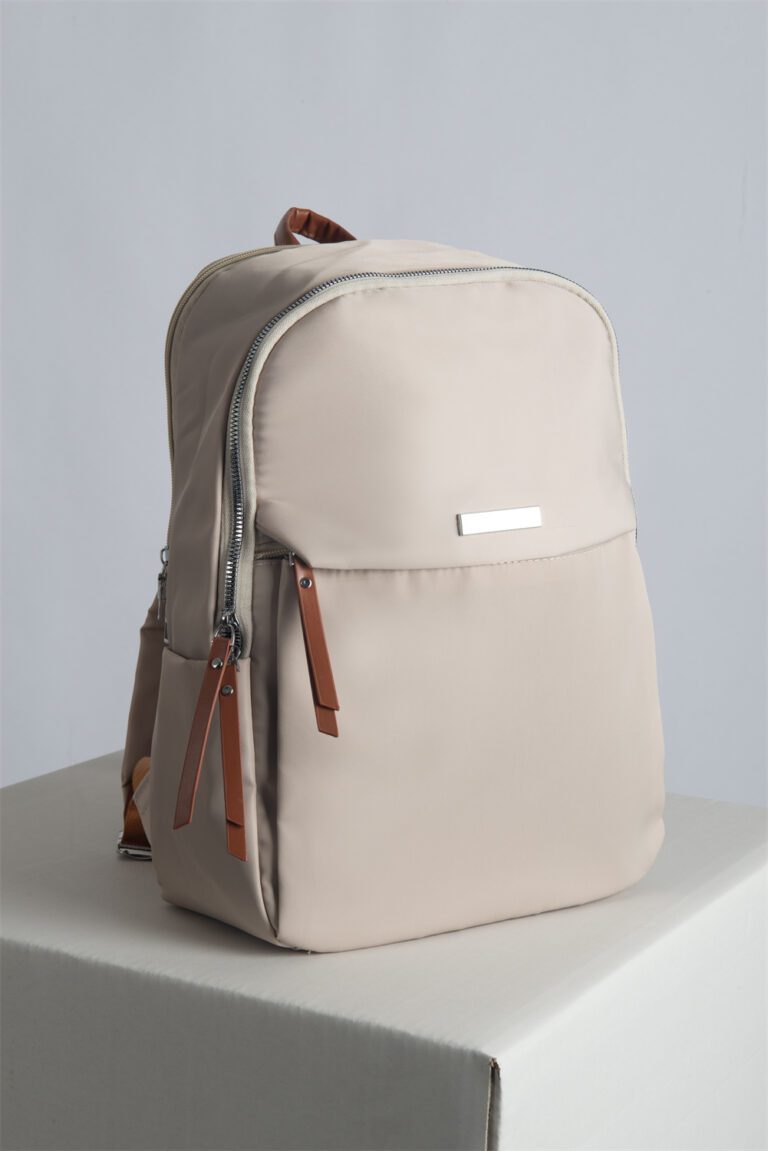 REDI is the perfect blend of classic elegance and urban practicality. This soft, waterproof backpack is designed for professionals on the move, featuring multiple compartments and a spacious fit for laptops up to 15 inches. Equipped with a trolley sleeve for easy travel and a secure anti-theft pocket, REDI ensures your belongings stay safe during business trips and daily commutes.