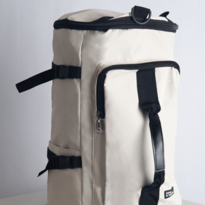 SUPOTSU sporty lightweight backpack in white, worn crossbody or as a backpack with padded shoulder straps.