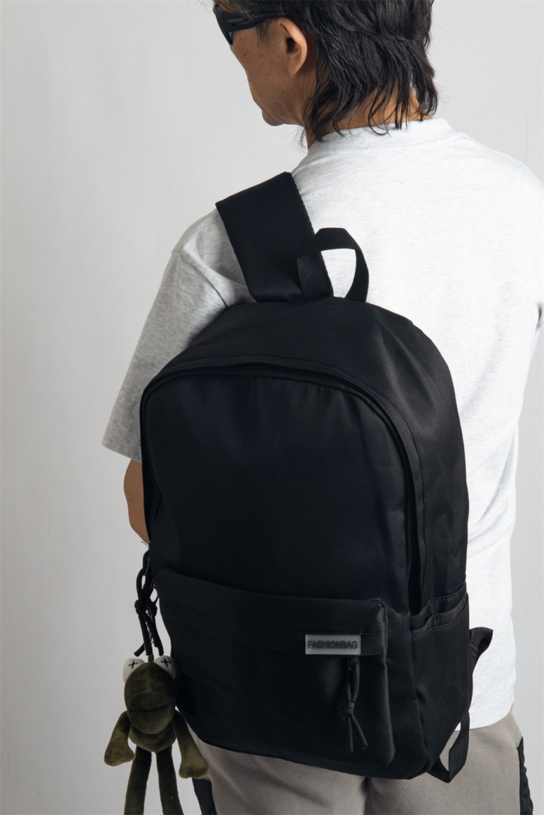 This hip, minimalistic Japanese backpack blends effortlessly with any casual outfit. Perfect for everyday wear, it features dedicated compartments for your laptop, iPad, and phone, keeping your essentials organized. An anti-theft back pocket provides extra security for your wallet and personal items. Style it with our adorable frog bag charm for a playful fashion upgrade.