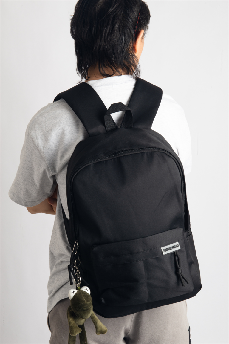 This hip, minimalistic Japanese backpack blends effortlessly with any casual outfit. Perfect for everyday wear, it features dedicated compartments for your laptop, iPad, and phone, keeping your essentials organized. An anti-theft back pocket provides extra security for your wallet and personal items. Style it with our adorable frog bag charm for a playful fashion upgrade.
