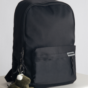 This hip, minimalistic Japanese backpack blends effortlessly with any casual outfit. Perfect for everyday wear, it features dedicated compartments for your laptop, iPad, and phone, keeping your essentials organized. An anti-theft back pocket provides extra security for your wallet and personal items. Style it with our adorable frog bag charm for a playful fashion upgrade.