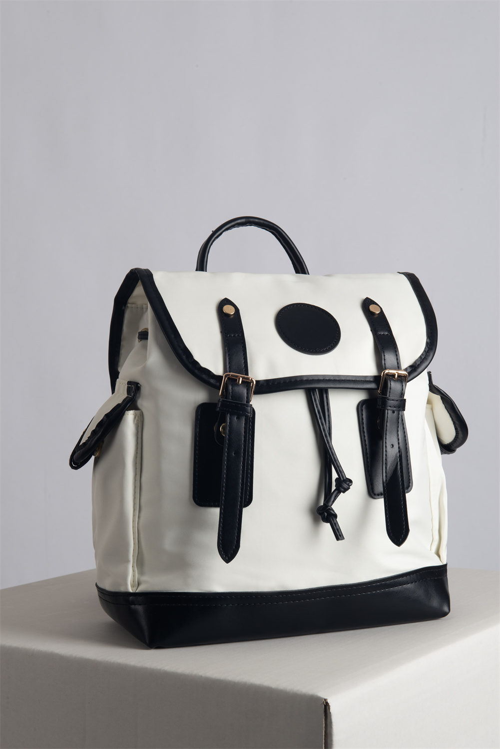 COCO blends British sophistication with Japanese minimalism in a vintage-style backpack perfect for work or school. Crafted from soft, smooth, and durable materials, it comfortably fits a 13.3'' laptop along with your everyday essentials—offering both elegance and practicality.