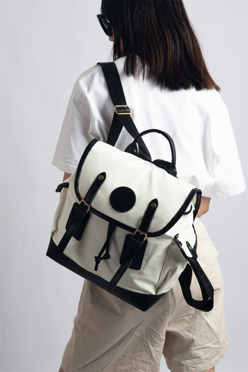 COCO blends British sophistication with Japanese minimalism in a vintage-style backpack perfect for work or school. Crafted from soft, smooth, and durable materials, it comfortably fits a 13.3'' laptop along with your everyday essentials—offering both elegance and practicality.