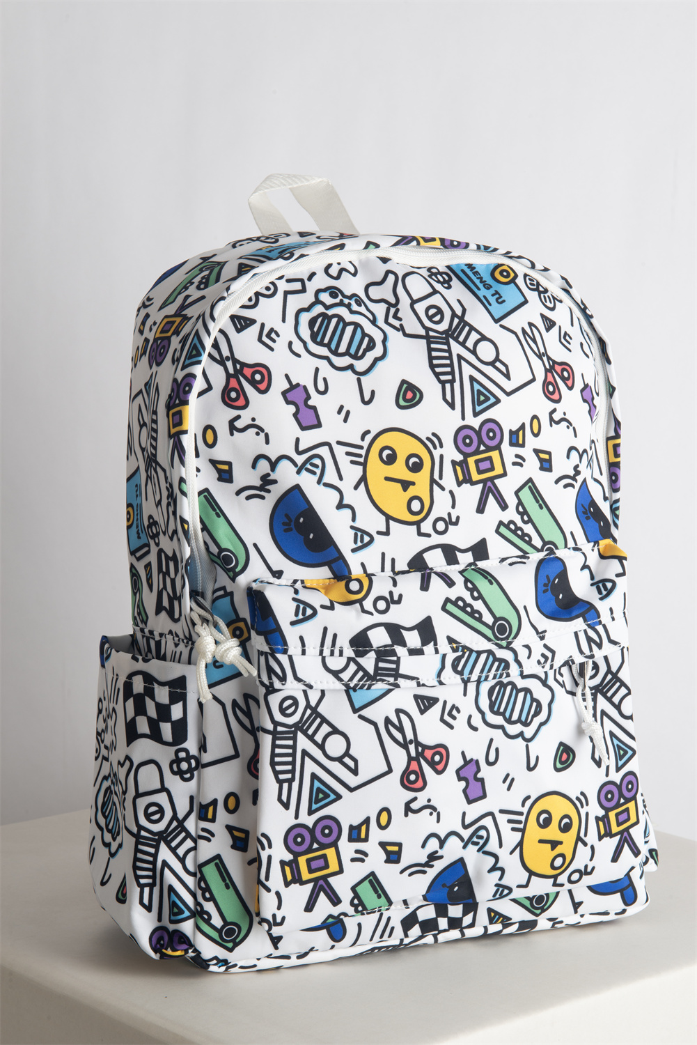 RAKU is a stylish and playful backpack built for daily use. Featuring an anti-theft back pocket and padded 15" laptop compartment, it keeps school essentials safe and secure.