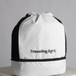 RYOKO is your go-to backpack for gym days and travel adventures. Whether you're heading to a soccer game or preparing for scuba diving, this sleek and functional backpack helps you travel light. It features a separate bottom compartment for shoes and an interior divider for wet and dry items. Made from stain-resistant material, RYOKO maintains its fresh, polished look even with frequent use.