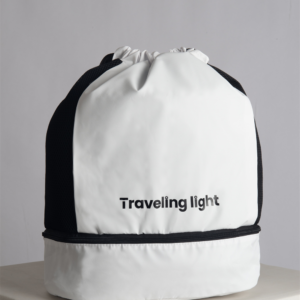 RYOKO is your go-to backpack for gym days and travel adventures. Whether you're heading to a soccer game or preparing for scuba diving, this sleek and functional backpack helps you travel light. It features a separate bottom compartment for shoes and an interior divider for wet and dry items. Made from stain-resistant material, RYOKO maintains its fresh, polished look even with frequent use.