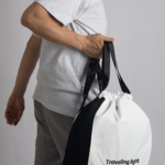 RYOKO is your go-to backpack for gym days and travel adventures. Whether you're heading to a soccer game or preparing for scuba diving, this sleek and functional backpack helps you travel light. It features a separate bottom compartment for shoes and an interior divider for wet and dry items. Made from stain-resistant material, RYOKO maintains its fresh, polished look even with frequent use.