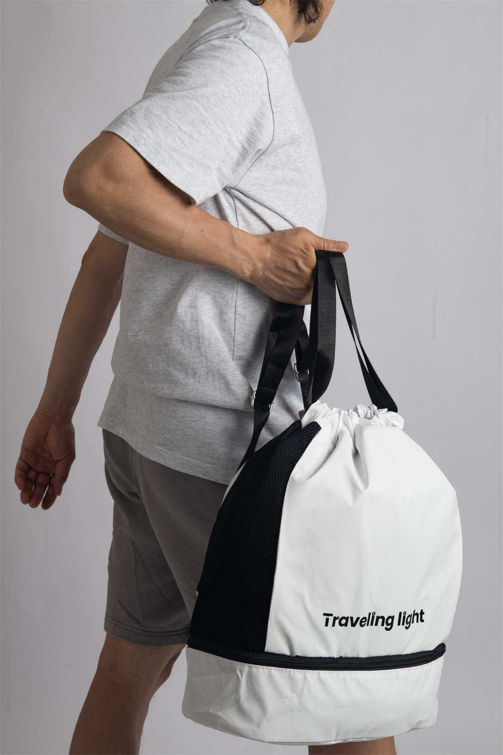 RYOKO is your go-to backpack for gym days and travel adventures. Whether you're heading to a soccer game or preparing for scuba diving, this sleek and functional backpack helps you travel light. It features a separate bottom compartment for shoes and an interior divider for wet and dry items. Made from stain-resistant material, RYOKO maintains its fresh, polished look even with frequent use.