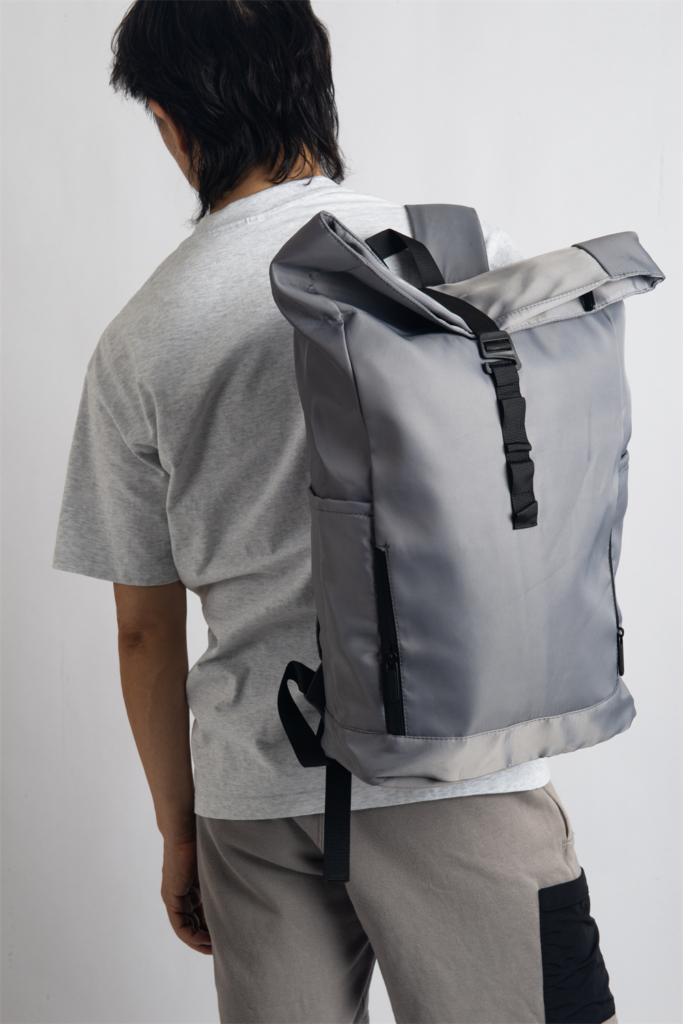 Lightweight modern roll-top backpack with ergonomic design, ideal for office use and tech gear storage.