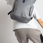 WORK GEN is a modern roll-top backpack designed for comfort and capacity. Its ergonomic shoulder straps and breathable back panel reduce strain, making it ideal for long commutes or busy workdays. Spacious enough to hold a 15.6'' laptop, headset, and daily office essentials, this lightweight bag blends function with smart design.