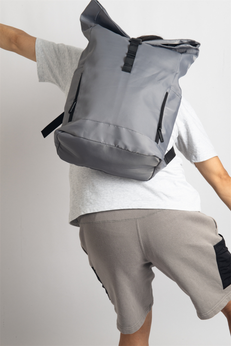 WORK GEN is a modern roll-top backpack designed for comfort and capacity. Its ergonomic shoulder straps and breathable back panel reduce strain, making it ideal for long commutes or busy workdays. Spacious enough to hold a 15.6'' laptop, headset, and daily office essentials, this lightweight bag blends function with smart design.