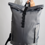 WORK GEN is a modern roll-top backpack designed for comfort and capacity. Its ergonomic shoulder straps and breathable back panel reduce strain, making it ideal for long commutes or busy workdays. Spacious enough to hold a 15.6'' laptop, headset, and daily office essentials, this lightweight bag blends function with smart design.