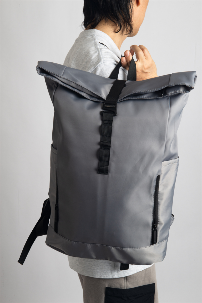 WORK GEN is a modern roll-top backpack designed for comfort and capacity. Its ergonomic shoulder straps and breathable back panel reduce strain, making it ideal for long commutes or busy workdays. Spacious enough to hold a 15.6'' laptop, headset, and daily office essentials, this lightweight bag blends function with smart design.
