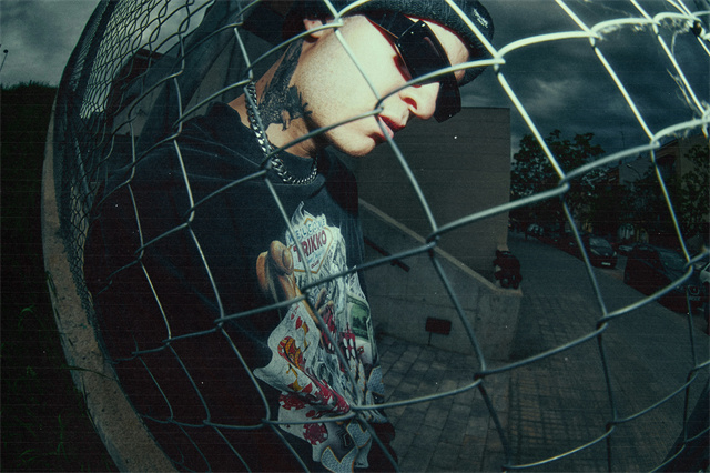 Capture the raw energy of the city with our male streetwear stylish backpack collection. This gritty, fish-eye perspective shot embodies the rebellious and unique style that defines our backpack brand's gen z aesthetic.