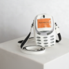 Ditch the traditional look with MY CELL, a Japanese-style crossbody designed for the bold. Shaped like a vintage mobile phone, this white bag features a vibrant orange "screen" and tactile keypad graphics. Built for the youth who value unconventional design, it’s the ultimate Y2K-inspired statement piece for your daily essentials.