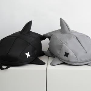 Our signature shark backpacks are designed for those who find traditional bags boring. Featured here in sleek black and stone gray, these bags boast a bold 3D fin design and minimalist 'X' eye detailing. It’s the ultimate unconventional accessory for youth who live for Japanese-inspired, standout style.