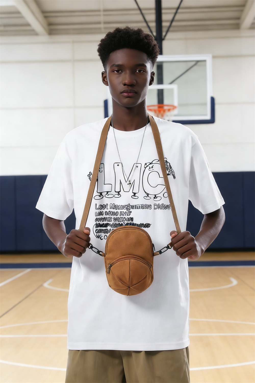 An American high schooler wearing the HATTO mustard yellow mini crossbody bag while standing on the school basketball court.