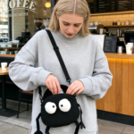 Cute crossbody bag inspired by Japanese cartoon character, perfect for students who like trendy and cute bags. Compact and lightweight, offering plenty of room for your phone, wallet, and sunscreen.