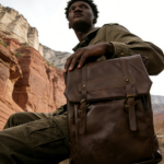 Waterproof PU leather backpack in brown, dark academia style perfect for work, school, and travel. Waterproof and wear-resistant, keeps the vintage look fresh. Backpack has many compartments, adjustable straps, and fits a 14 inch laptop.